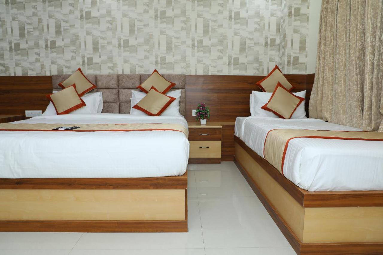 Hotel 8th Mile Suites Bangalore Exterior foto